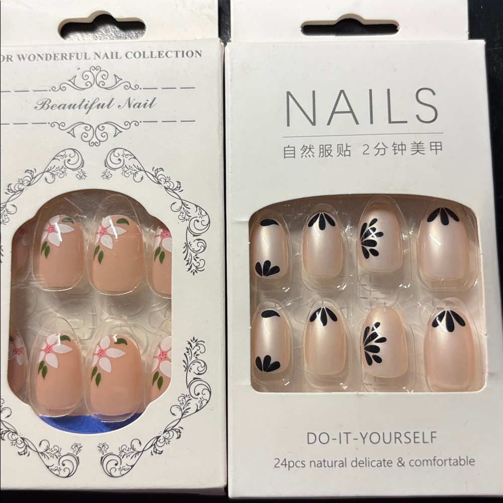 Two (2) Sets of Press on Nails Medium length